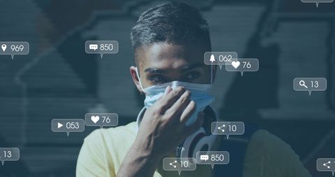 Young Man Adjusting Face Mask Amid Social Media Overlays - Download Free Stock Images Pikwizard.com