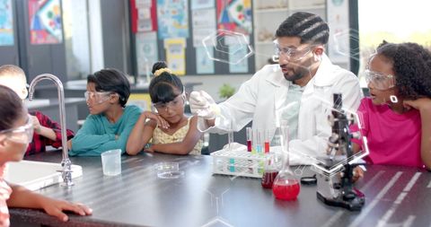 Teacher Demonstrating Chemistry Concepts to Curious Students - Download Free Stock Images Pikwizard.com