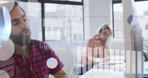 Business Consultant Working with Data Analytics in Modern Office