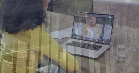 Businesswomen Engaged in Virtual Meeting with Financial Data Overlay - Download Free Stock Images Pikwizard.com
