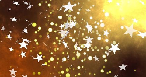 White star confetti drifting over warm golden bokeh backdrop, glowing festive abstract