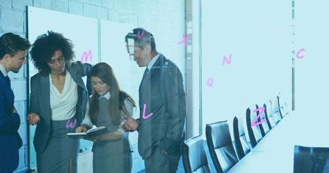 Executive team reviewing strategy on glass wall with magenta notes in modern boardroom