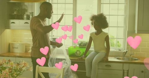 Father and Daughter Bond Over Recycling in Cozy Kitchen