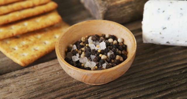 Assorted Peppercorns and Rock Salt in Wooden Bowl on Rustic Table - Download Free Stock Images Pikwizard.com