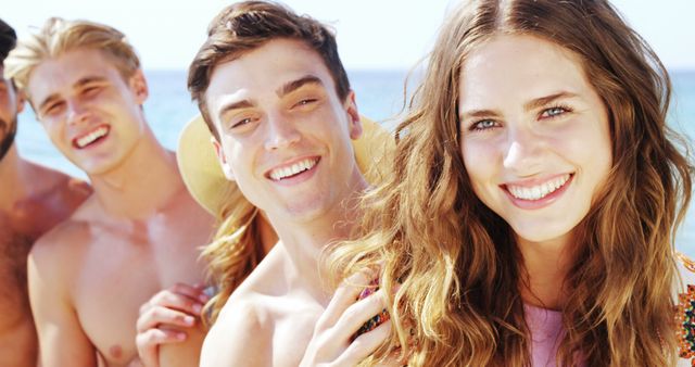 Group of Friends Smiling and Enjoying Beach Day - Download Free Stock Images Pikwizard.com