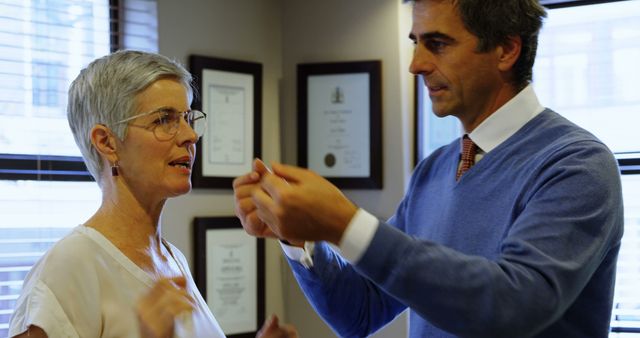 Physical therapist working with senior patient during therapy session - Download Free Stock Images Pikwizard.com