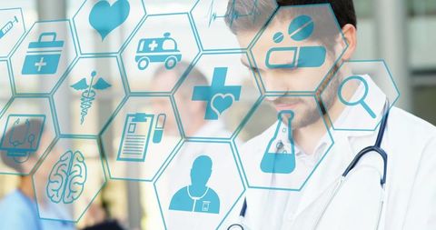 Caucasian doctor interacting with digital medical interface