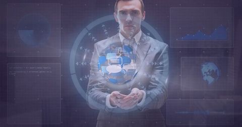 Businessman interacting with holographic data interfaces