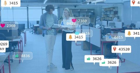 Reviewing Tablet in Open Office with Social Media Notification Overlays, Collaborating Coworkers