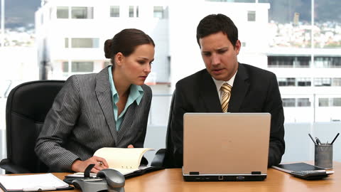 Focused Business Collaboration in Modern Office Setting