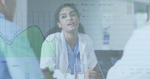 Healthcare Team Analyzing Data in Hospital Meeting Room