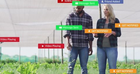 Farmers engaging with technology in modern farming environment