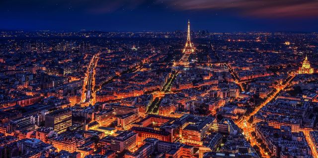 Aerial View of Paris at Night with Illuminated Eiffel Tower - Download Free Stock Photos Pikwizard.com