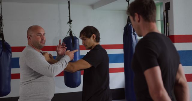 Martial Arts Instructor Teaching Students in Training Gym - Download Free Stock Images Pikwizard.com