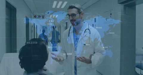 Doctor consulting patient using augmented reality health data overlay in hospital corridor