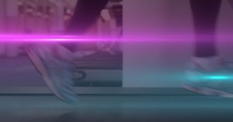 Running on Treadmill with Vibrant Light Effects in Gym