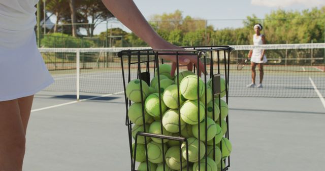 Packed Tennis Ball Rack on Court Ready for Practice - Download Free Stock Images Pikwizard.com