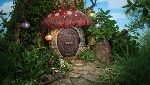 Whimsical mushroom cottage hidden in lush forest clearing