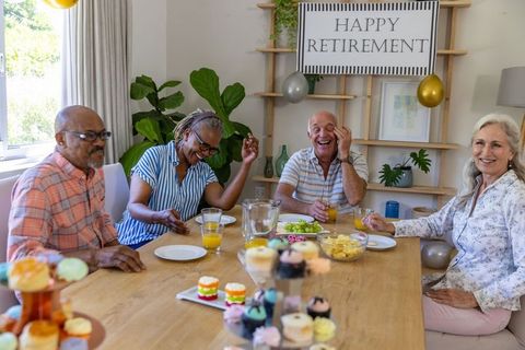 Diverse Senior Friends Celebrating Retirement Together with Joyful Festivity