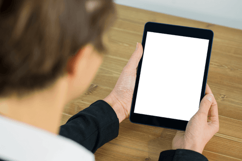 businesswoman holding tablet with transparent screen at wooden desk - Download Free Stock Videos Pikwizard.com