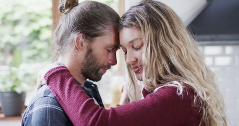 Happy Couple Embracing at Home Amid Daily Life - Download Free Stock Images Pikwizard.com