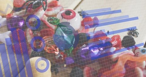 Layering dataviz graphics over colorful craft beads, faceted gems and bokeh ornaments close-up