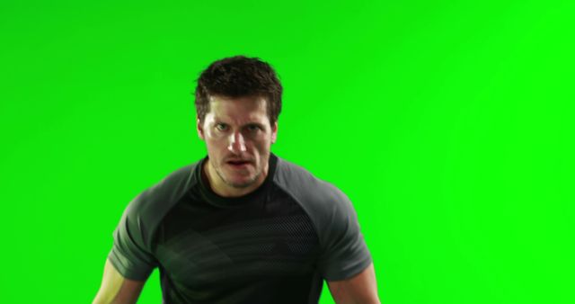 Male Athlete in Action Against Green Screen Background - Download Free Stock Images Pikwizard.com