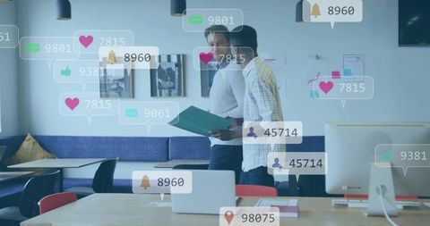 Multiracial team collaborating and editing social media content with analytics overlays in coworking
