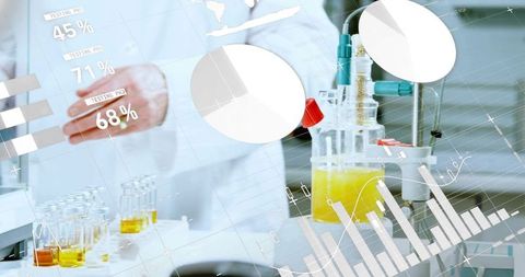 Scientist handling glass reactor on lab bench with digital data overlays and test tubes