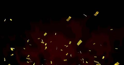 Golden Confetti Over Vibrant Red and Black Background