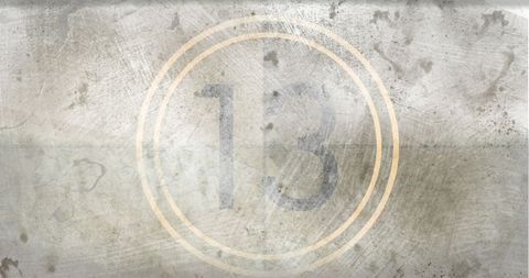 Vintage Number 13 on Grunge Weathered Background
