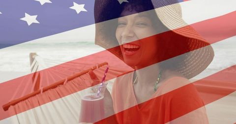 Joyful woman relaxing on beach hammock with american spirit