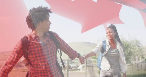 Young Couple Walking with Canadian Flag Overlay