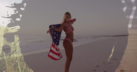 Joyful Woman Dancing with USA Flag on Beach at Sunset