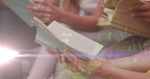 Students Engaged With Books Amidst Finance and Technology Themes