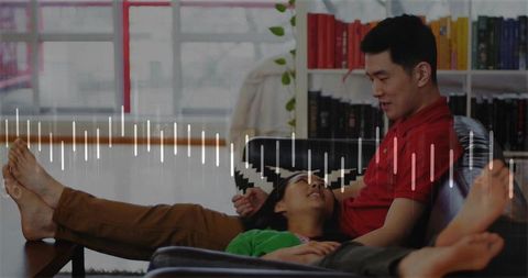 Couple enjoying relaxing day indoors with contemporary home decor