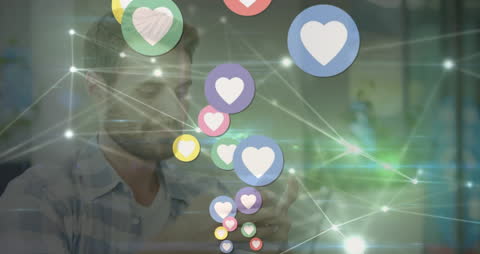 Heart Icons Over Man Using Smartphone at Home Visualization
