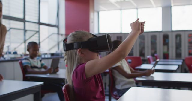 Young Students Using Virtual Reality and Tablets in Classroom - Download Free Stock Images Pikwizard.com