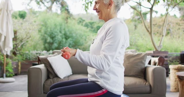 Senior Woman Exercising with Dumbbells in Outdoor Setting - Download Free Stock Images Pikwizard.com