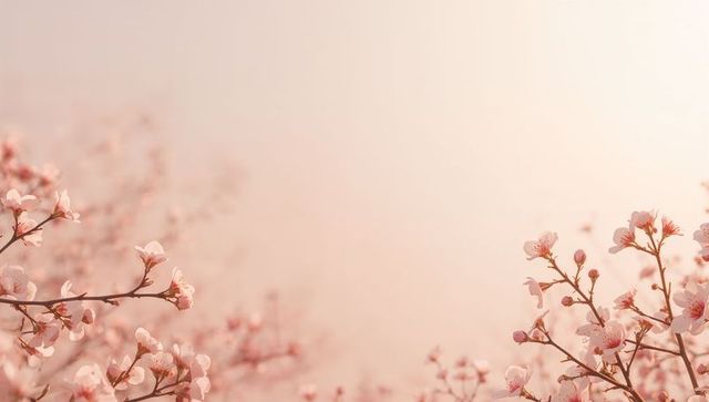 Blooming pink cherry blossom branches with soft pastel bokeh and copy space