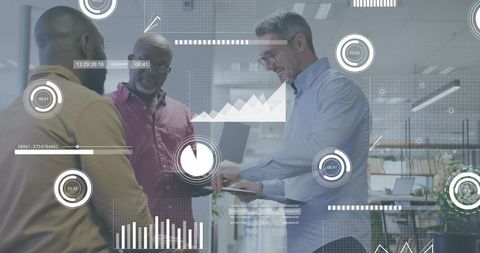 Collaborating and analyzing dashboards on laptop and tablet in open-plan office with hud