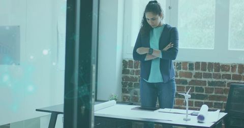 Focused Businesswoman Analyzing Global Networks