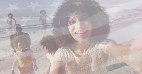 Joyful Family Beach Selfie Overlayed with American Flag