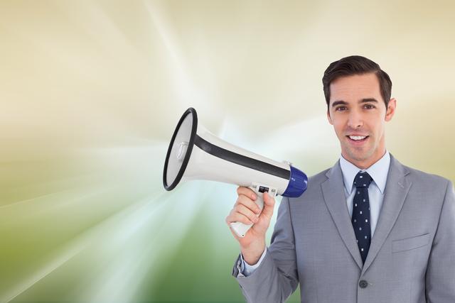 Confident businessman holding megaphone, shown in a professional setting, ideal for corporate communication, leadership training, marketing campaigns, speech-making, and promotional materials stressing confident messaging and public speaking skills.