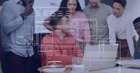 Cross-functional team collaborating around laptop with data visualization and ui overlays