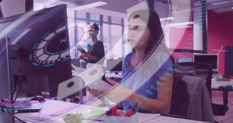 Woman streamlining workflow in futuristic office with advanced analytics