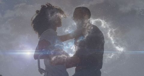 Intertwined in Cosmic Embrace Under Celestial Sky