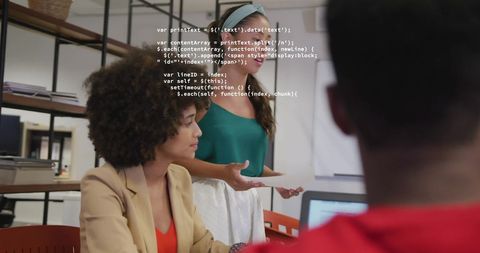 Diverse Team Discussing in Creative Office with Data Overlay