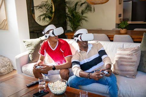 Men Enjoying Virtual Reality Gaming at Home