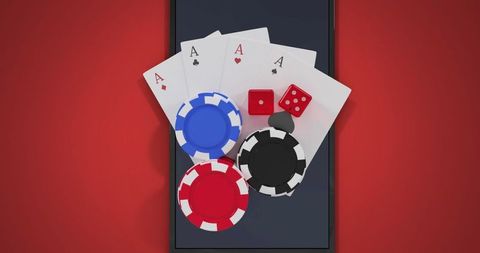 Online gambling concept with cards, dice, and chips on smartphone